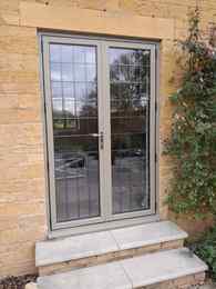 20241115_135538 aluminium flush french doors RAL 7034.jpg